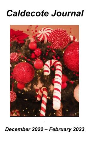 image of red Christmas decorations, baubles and red and white striped candy canes